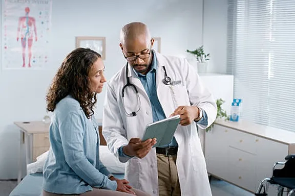 A woman talking to her doctor